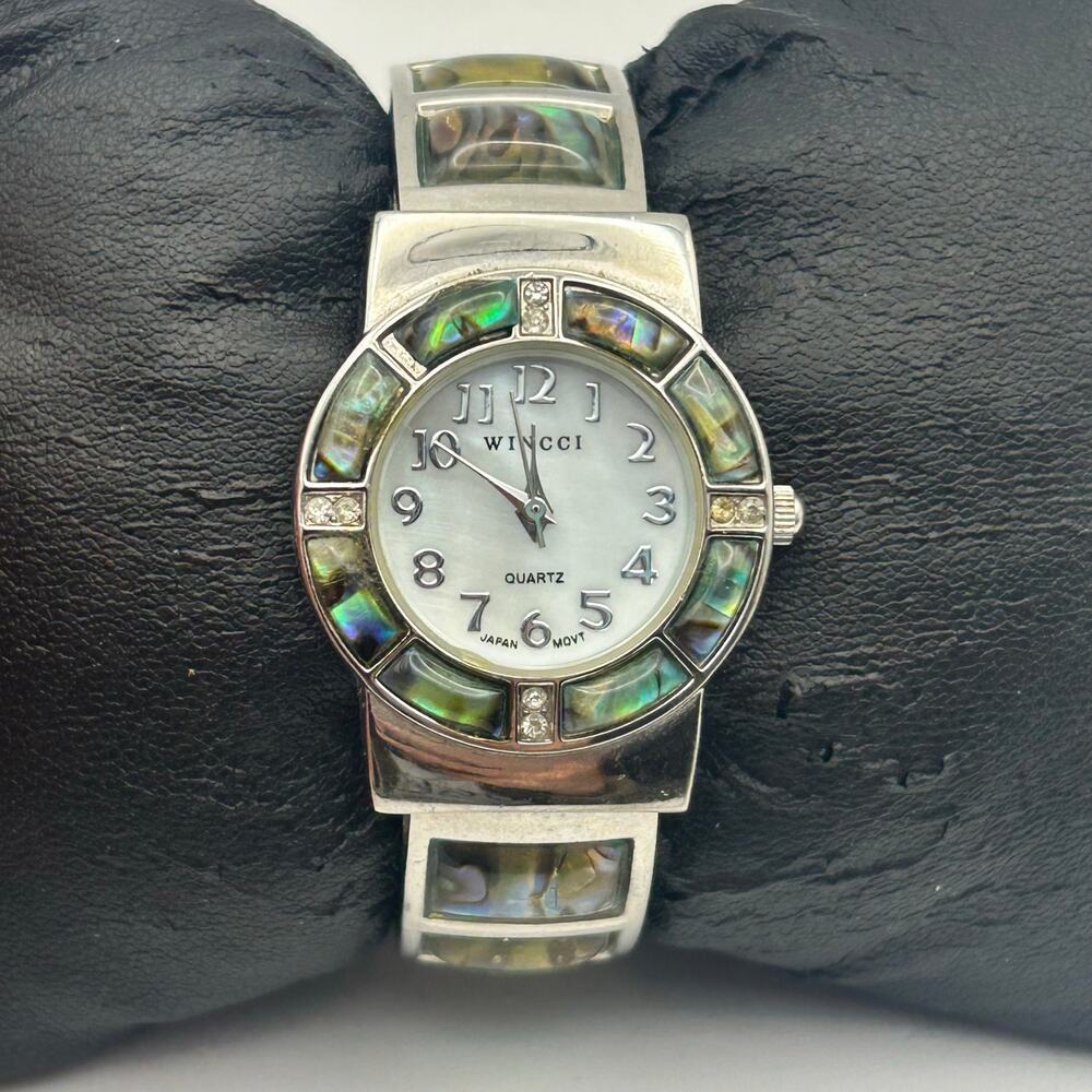 Wincci Mother Pearl Abalone Shell Inlay on the Bezel and Band Women’s Cuff Watch